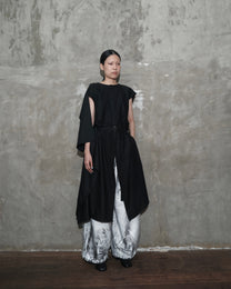 Kelawar Draped in Black
